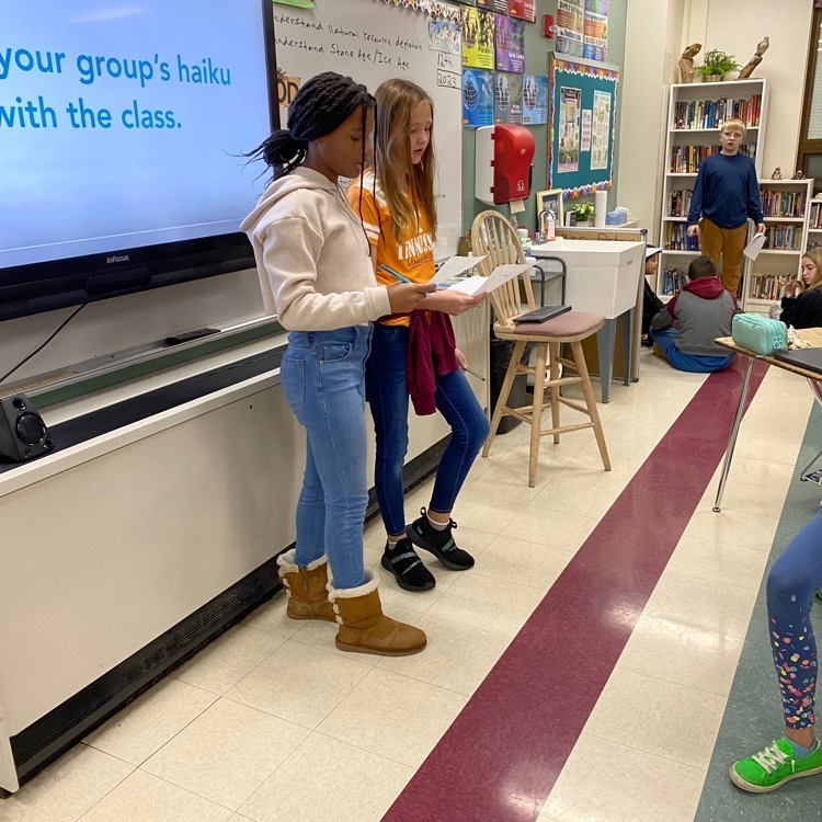 Students in Mrs. Patrick’s class got into groups for the morning “Move This World” activity. They wrote a Haiku, as a group, on their feelings and shared it with their classmates. 