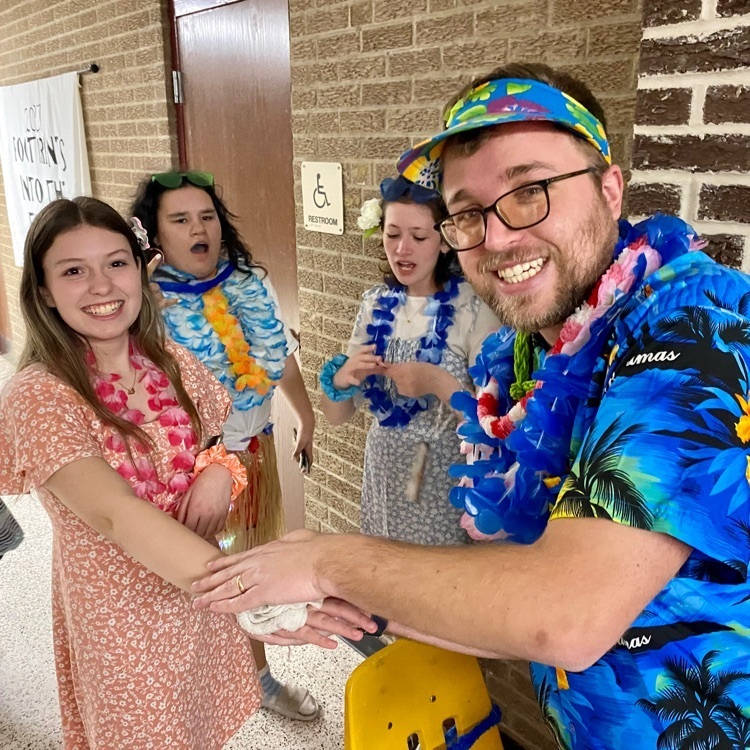 For FB:  The Hawaiian Luau was a success!  The students, danced, ate, got tattoos, did the limbo and made memories!