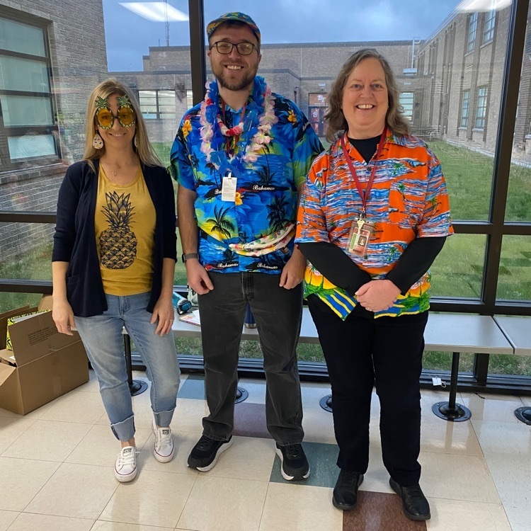 Mr. Anderson, Mrs. Clift, and Mrs. Patrick were ready for the Hawaiian Themed Dance. 